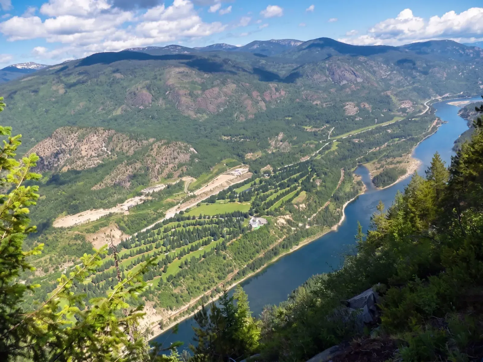 Aerial view of Birchbank Golf Course winding along the west bank of the Columbia River, between the Selkirk and Monashee mountains